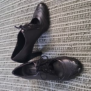 Connie black patent & leather lace-up w cut out vamp. 7